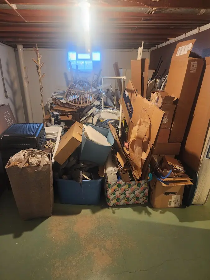 Roll-off dumpster container at job site for 20 Yard Dumpster Rental in Wilson's Mills